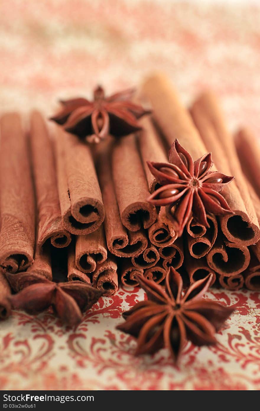 Aromatic spices isolated on a floral background