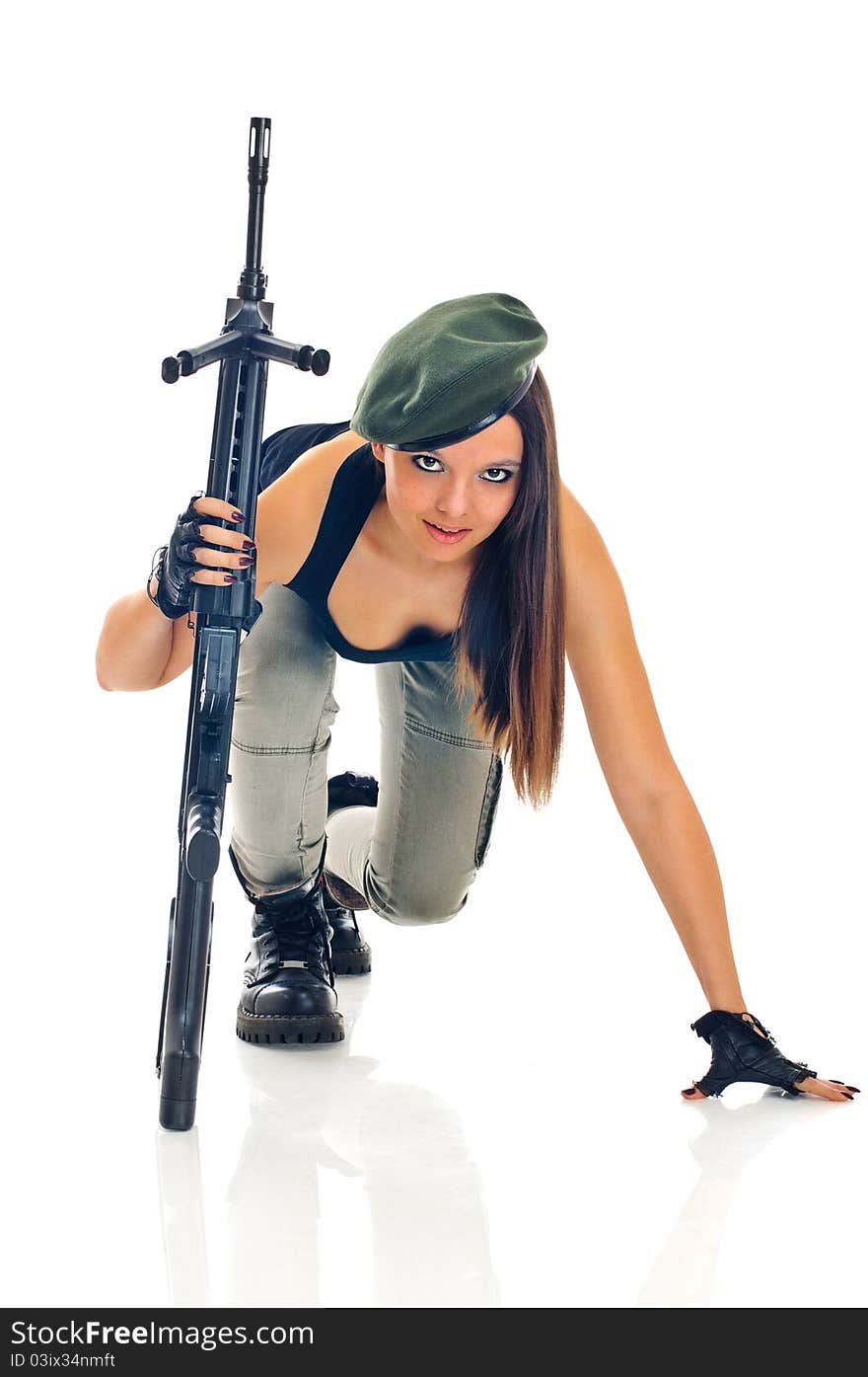 Young beauty girl with machine-gun on white background. Young beauty girl with machine-gun on white background