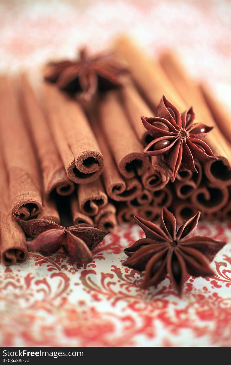 Aromatic spices isolated on a floral background