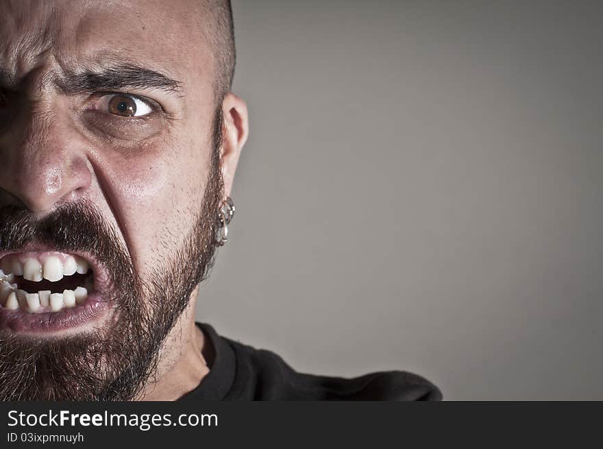 Mid-frontal portrait of a man yelling