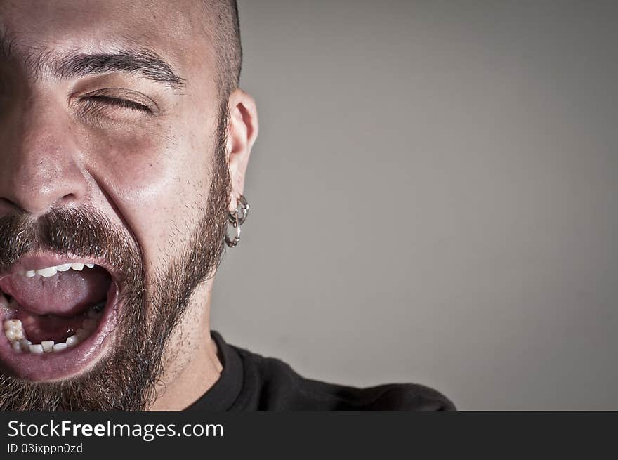 Half portrait of a man who winks