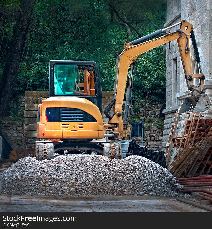 Heavy digger machine vehicle working at place