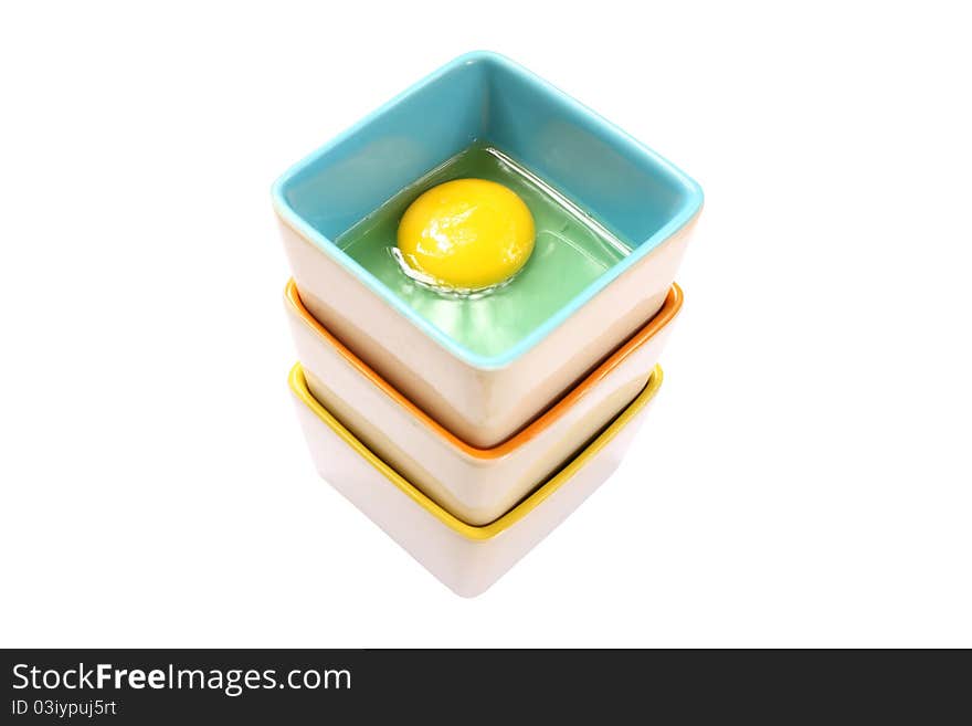 Raw egg in stack bowl