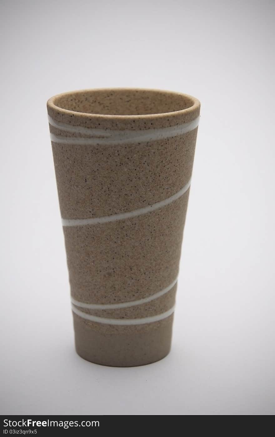 Clay tea cup as isolate background