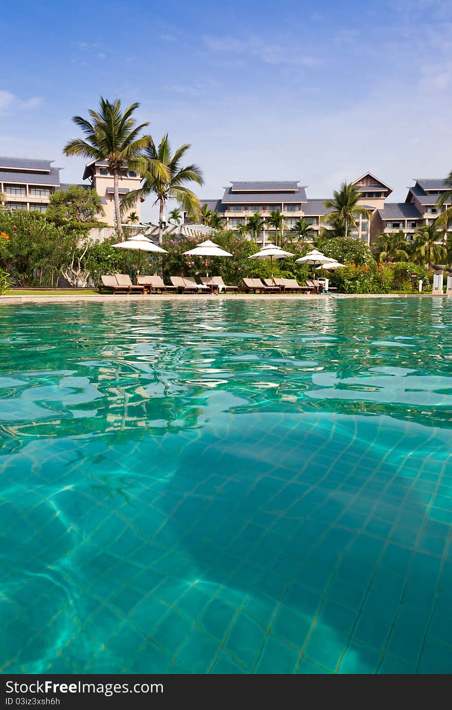 Beautiful swimming pool at hotel garden. Beautiful swimming pool at hotel garden.