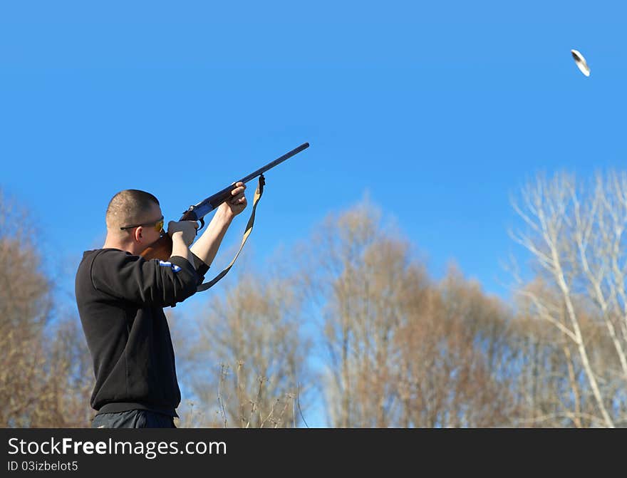 Male hunter aiming the hunt during a hunting party