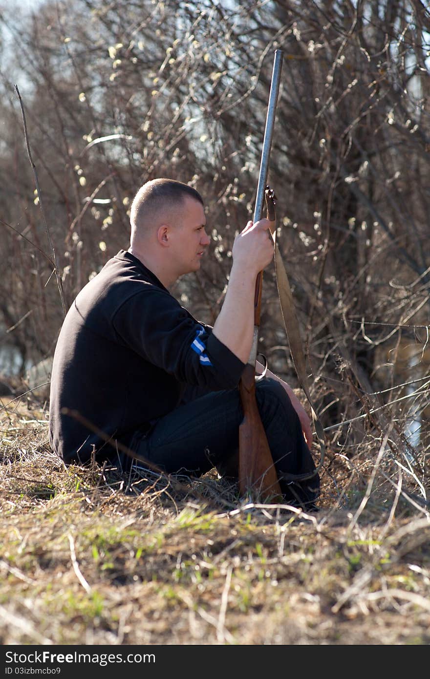 Male hunter aiming the hunt during a hunting party