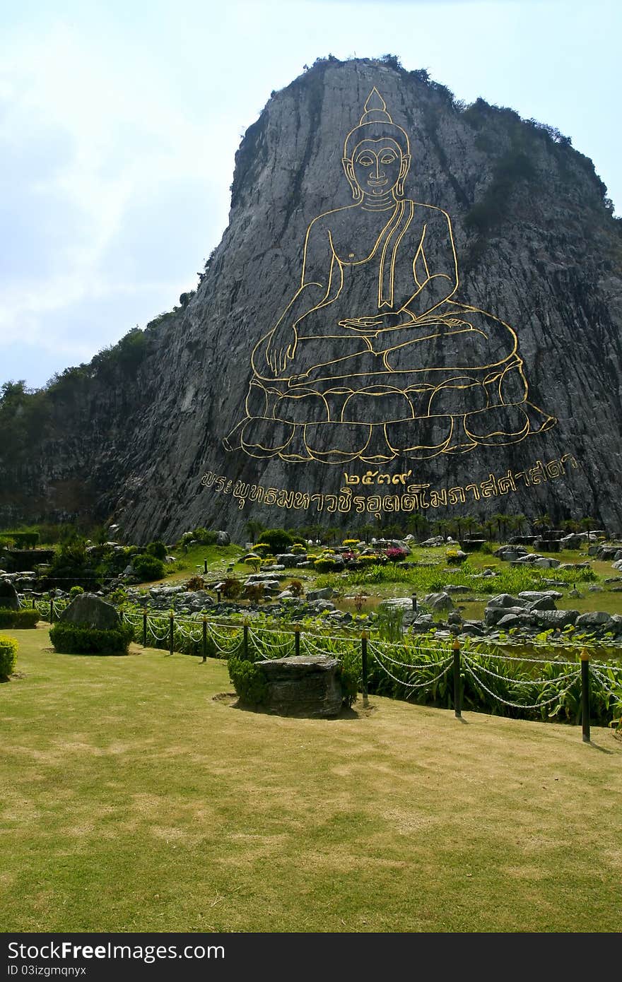 Gold contour of the Buddha on a mountain