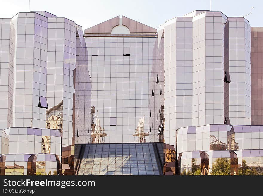 Modern Office Block with reflections of the Millenium Bridge on the glass