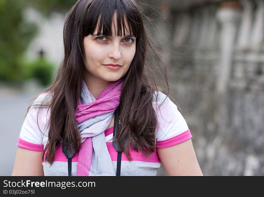 Fashion Model Posing, urban background. Selective focus.