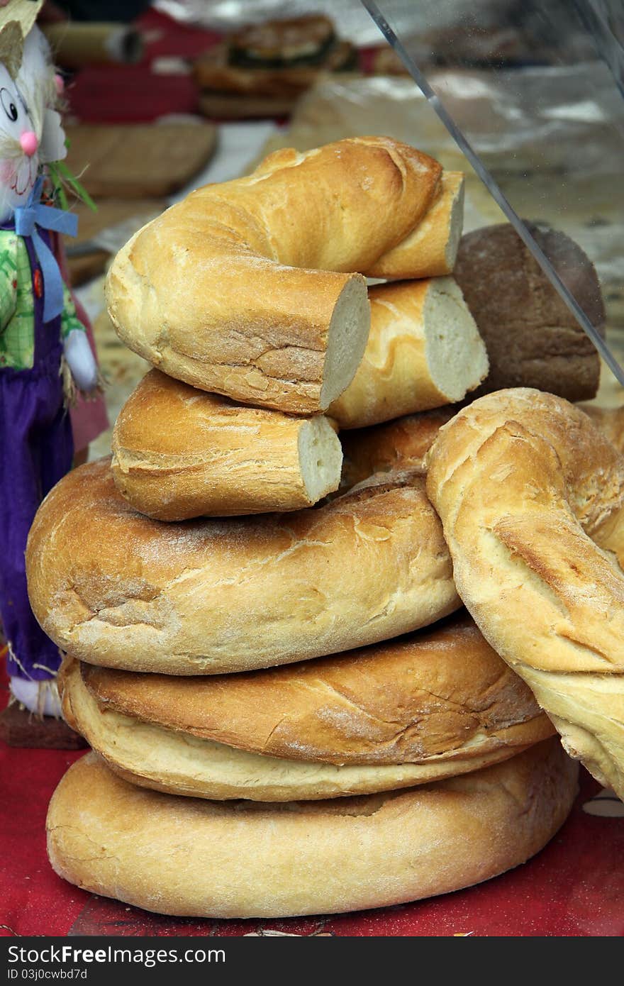 A pile of bread in a market. A pile of bread in a market