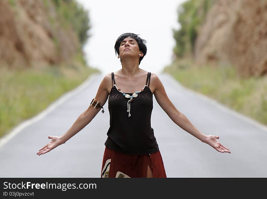 Woman dreaming on the road