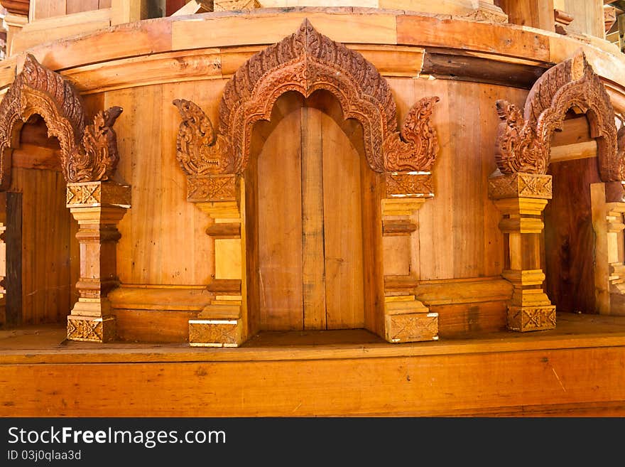 The carved wooden doors patterned on the temple. The carved wooden doors patterned on the temple.