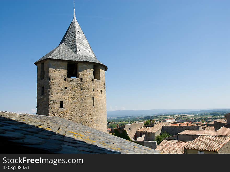 Ancient watchtower of Carcassonne chateau. Carcassonne is a ancient and fortified town in Aude department south France. It was added to the UNESCO list of World Heritage Sites in 1997.