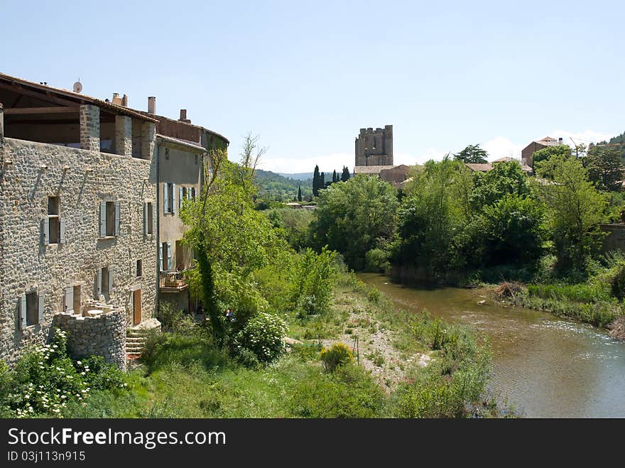 View of the oldest village Lagrasse, southern France. The Abbey of Saint Mary of Lagrasse (Abbaye Sainte-Marie de Lagrasse) is a Romanesque Benedictine abbey, whose origins date to the 7th century. View of the oldest village Lagrasse, southern France. The Abbey of Saint Mary of Lagrasse (Abbaye Sainte-Marie de Lagrasse) is a Romanesque Benedictine abbey, whose origins date to the 7th century.