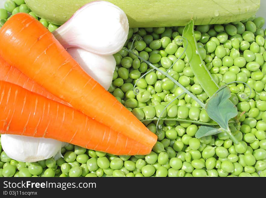 Prepared green peas, carrot, onion and squash. Prepared green peas, carrot, onion and squash