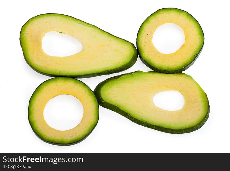 Slice avocado on white background. Studio shoot