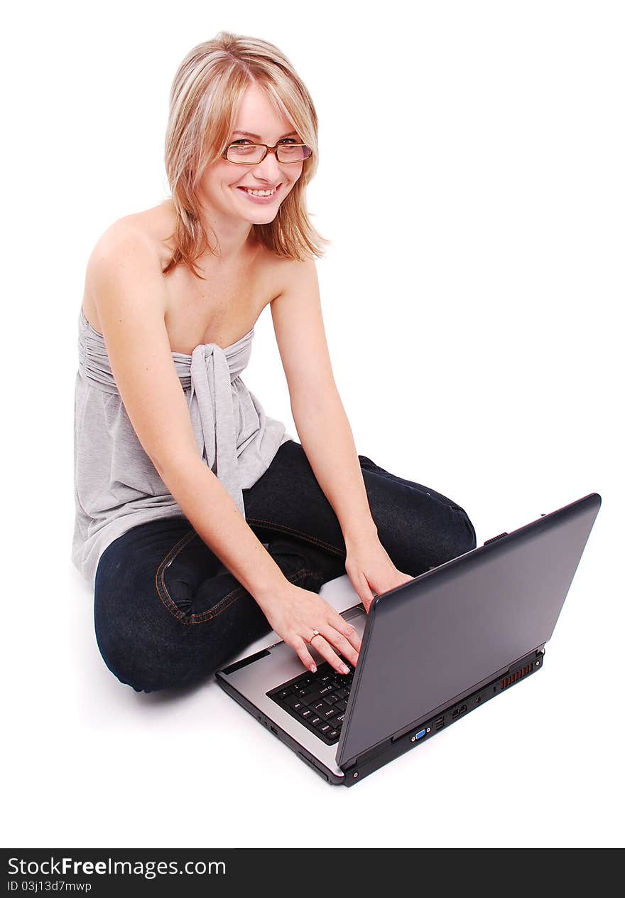 Beautiful young girl working on laptop