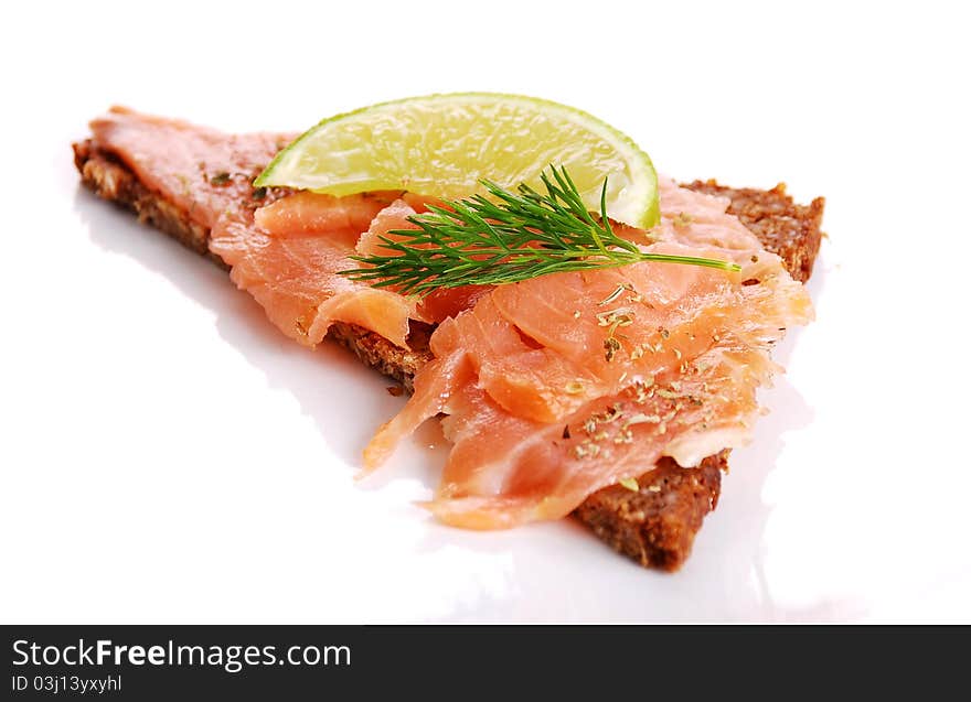 Fresh salmon sandwich on white background