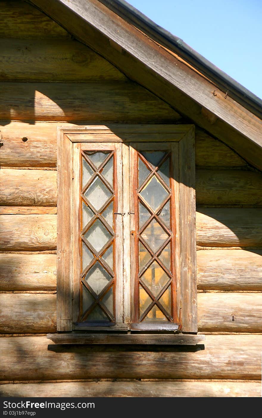 Traditional old window of rural wood house