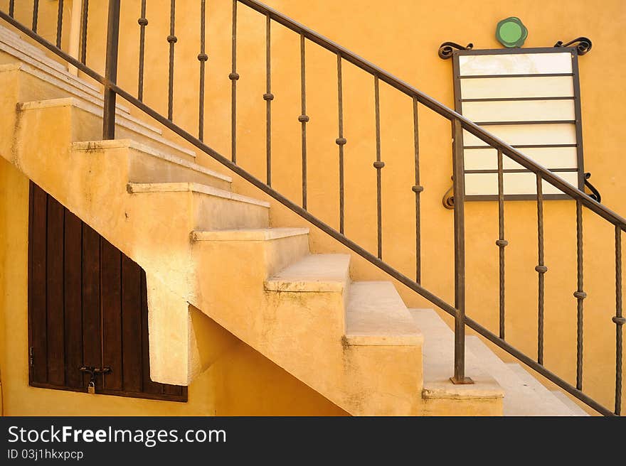 A stair in a building with notice in background