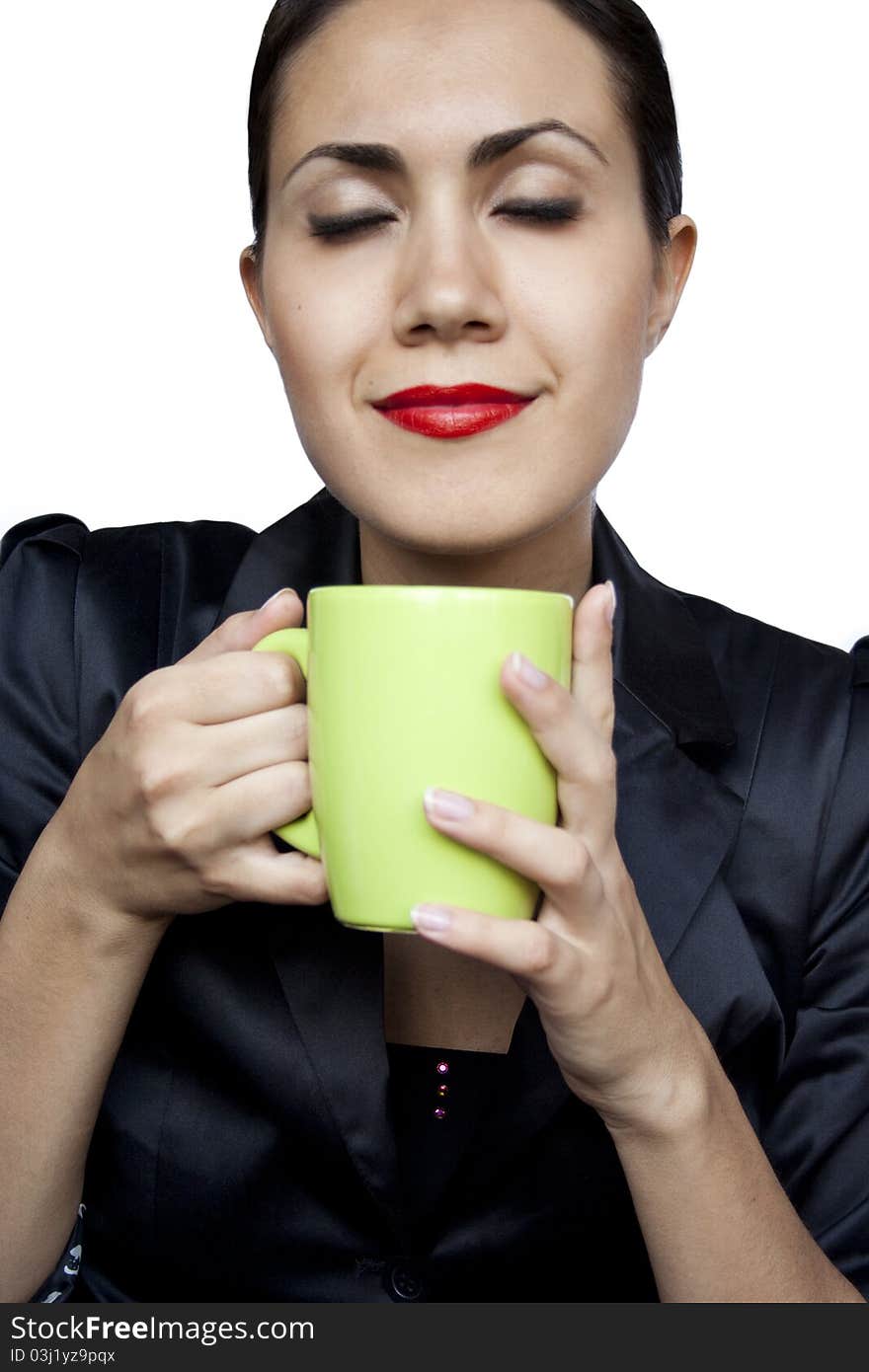 Happy businesswoman with a green cup