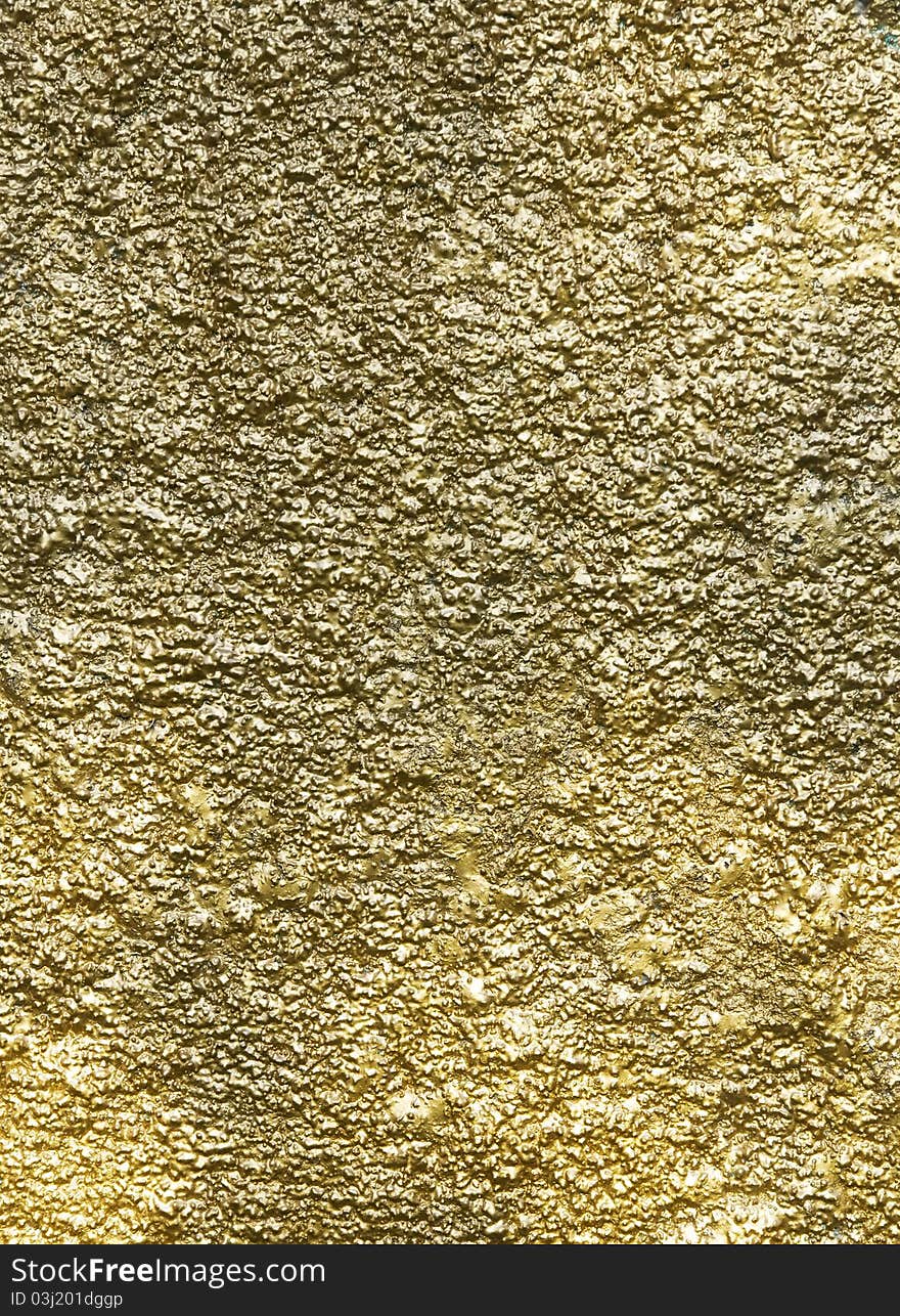 Wall texture in the outdoor of house, paint with gold color, good for background. Wall texture in the outdoor of house, paint with gold color, good for background