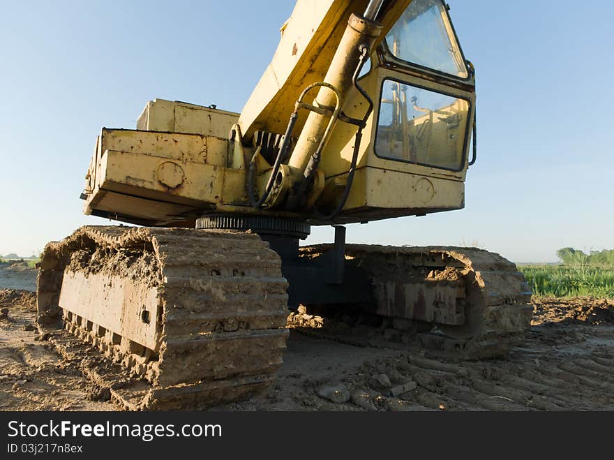 Digger, Heavy Duty construction equipment parked at work site