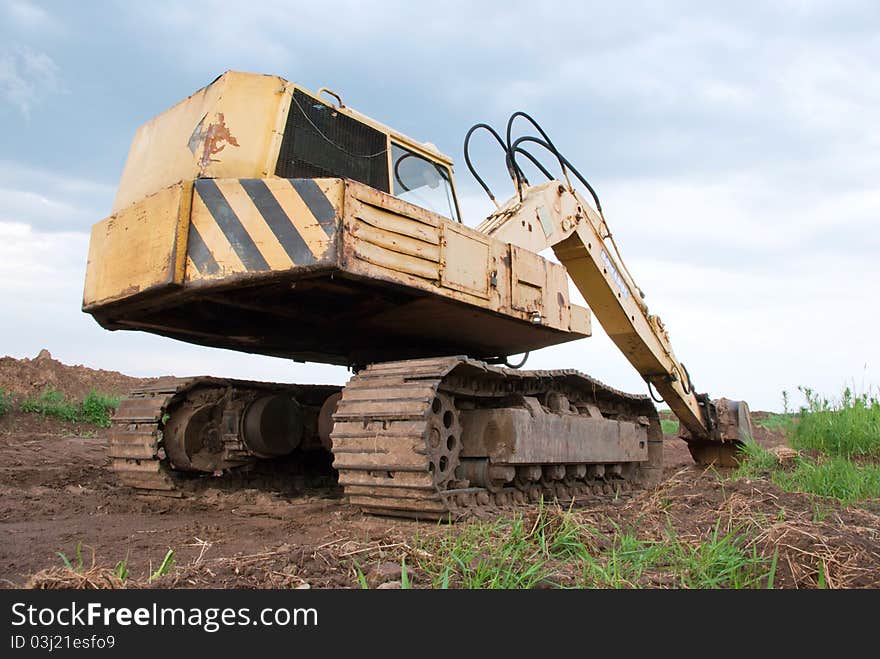 Digger, Heavy Duty construction equipment parked at work site