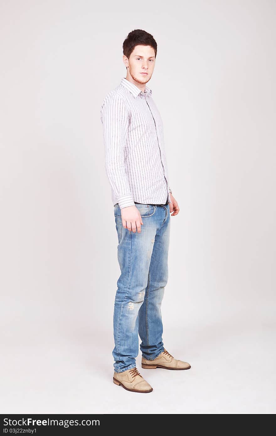 Stylish young man standing