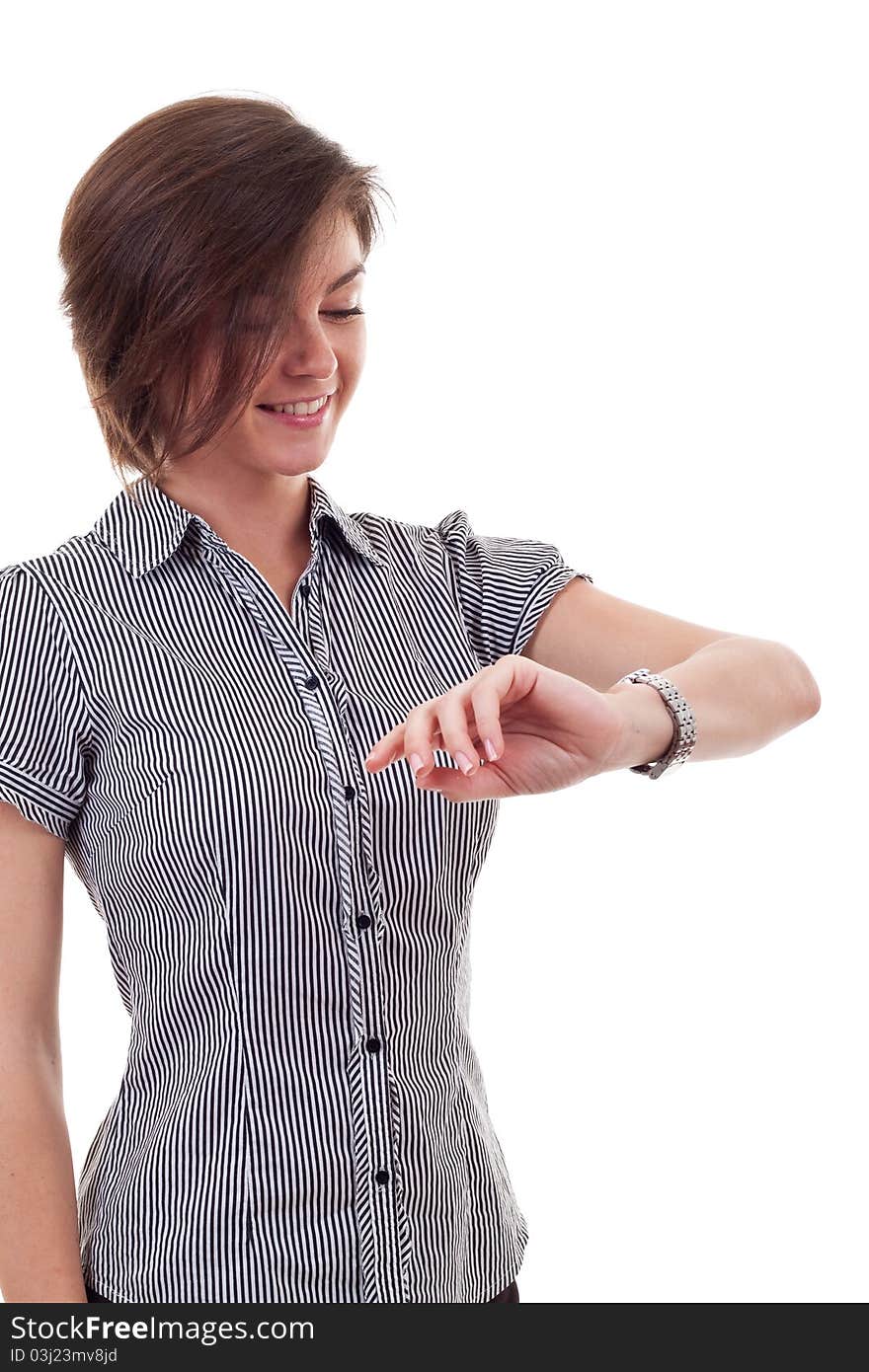 Young business woman looking at the time over white