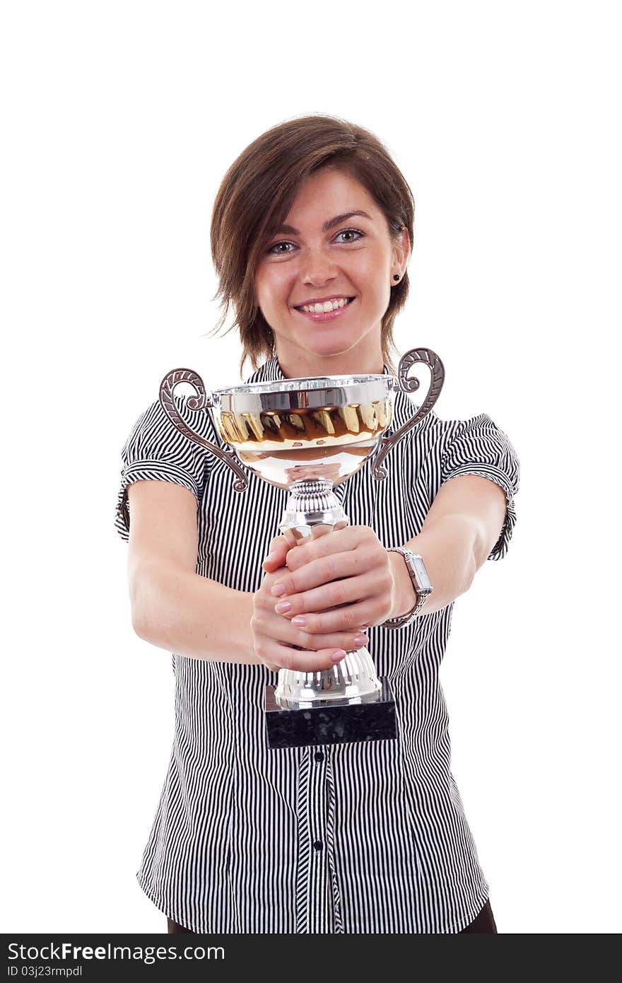 Happy business woman showing her big trophy over white