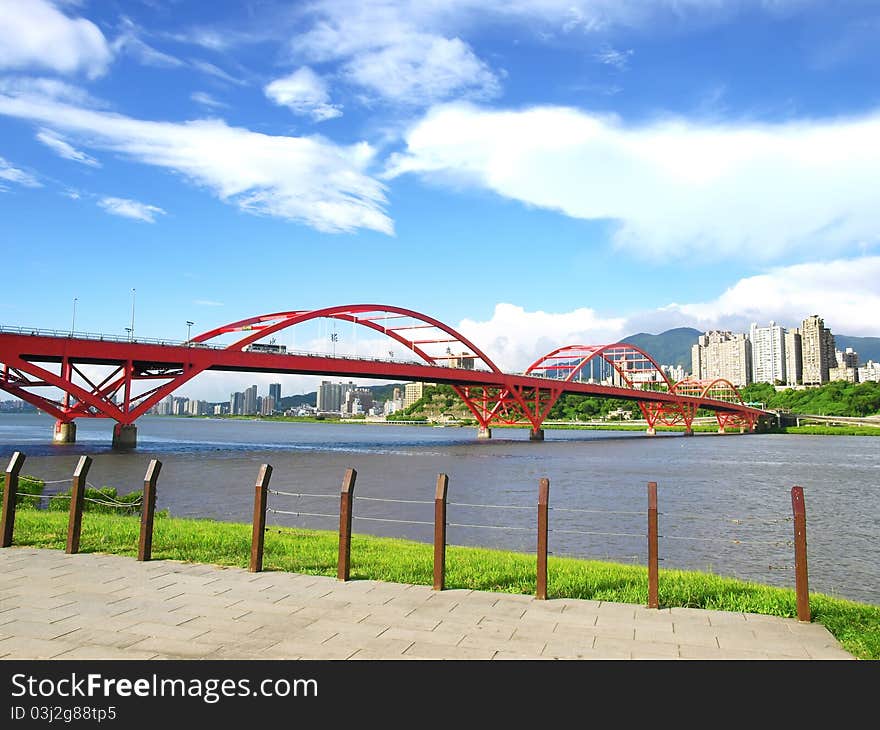 Arch bridge and river bank