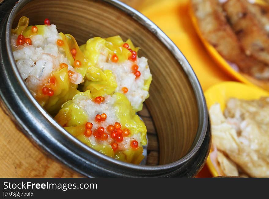 Chinese Shrimp Dim Sum with Fish Egg in Bamboo Basket