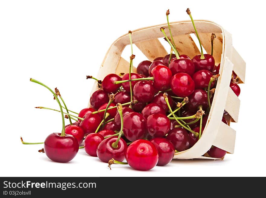 Scattered cherries isolated on white