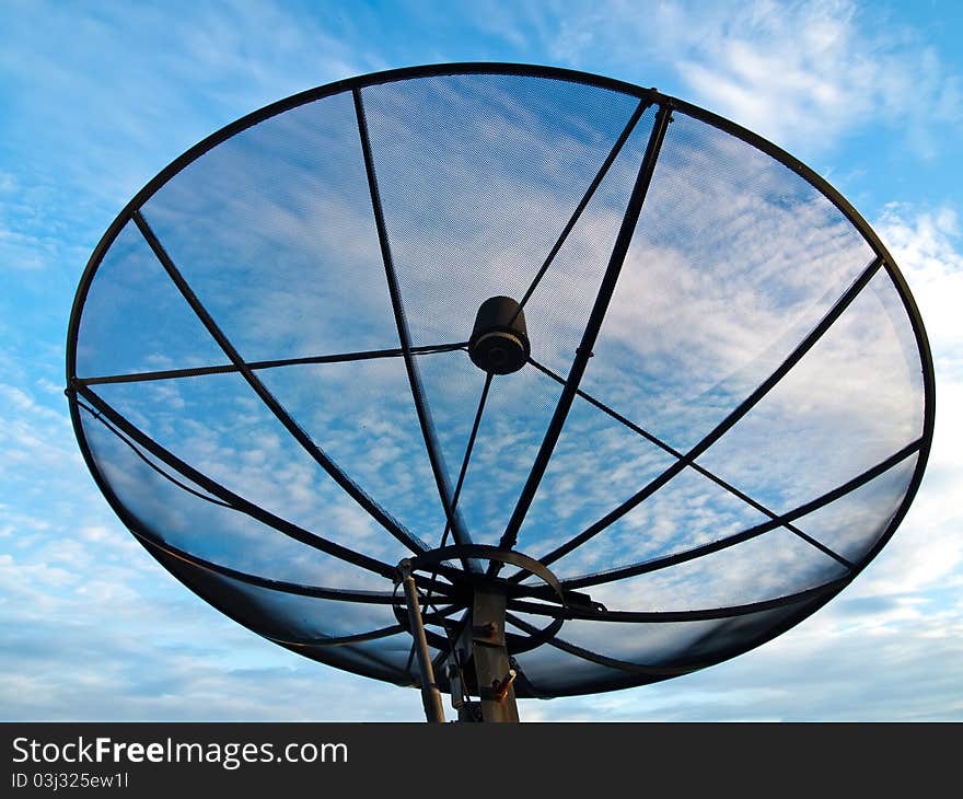 Satellite dish antennas under blue sky on the background