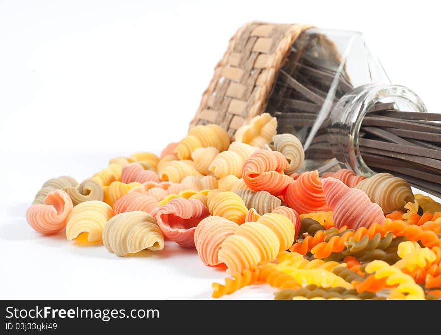 Different kinds of italian pasta on white background