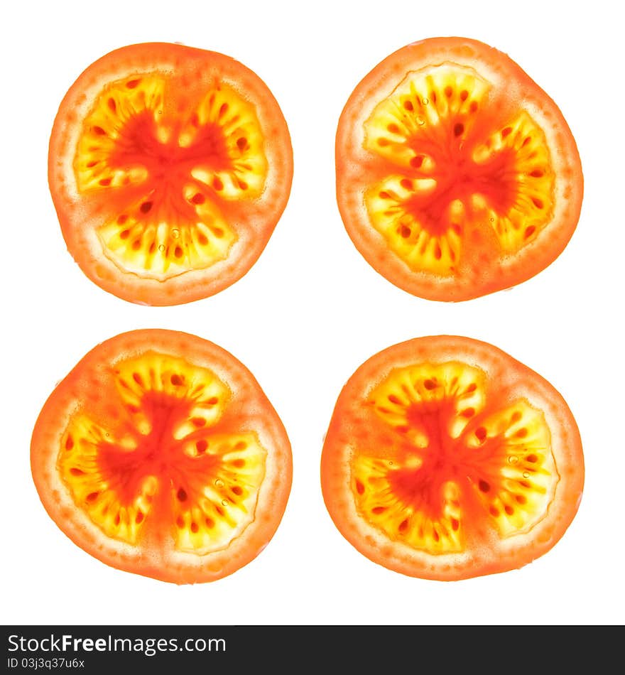 Slices of Tomato isolated on a white background.