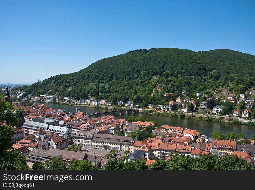 View of Heidelberg, Germany with Neckar River and Bridge.