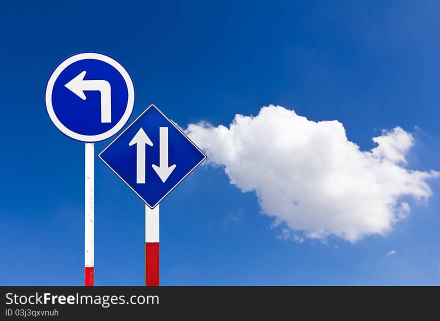 Curved Road Traffic Sign over blue sky,turn left