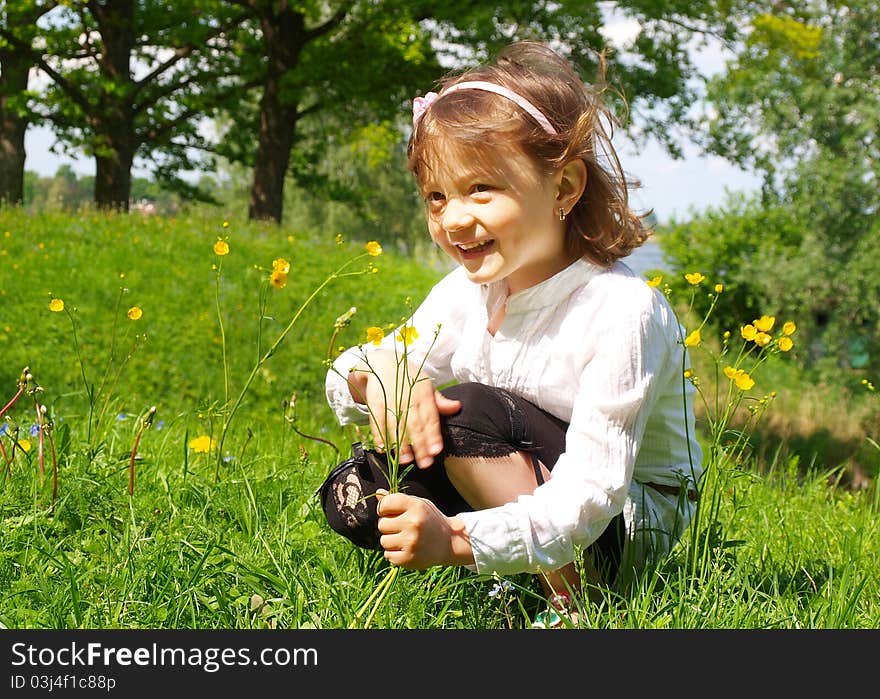 Girl picking flowers