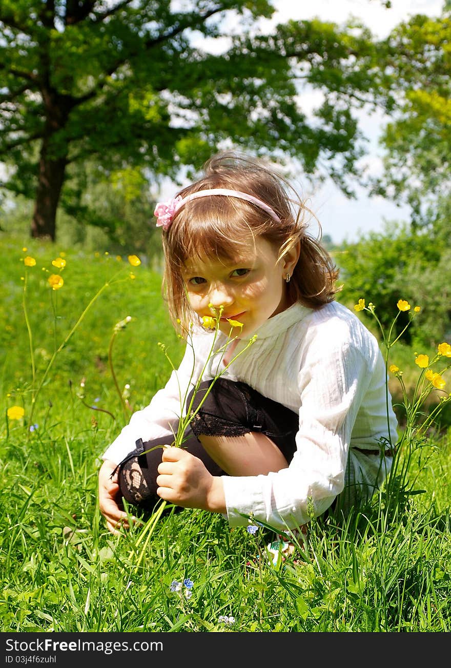 Girl picking flowers