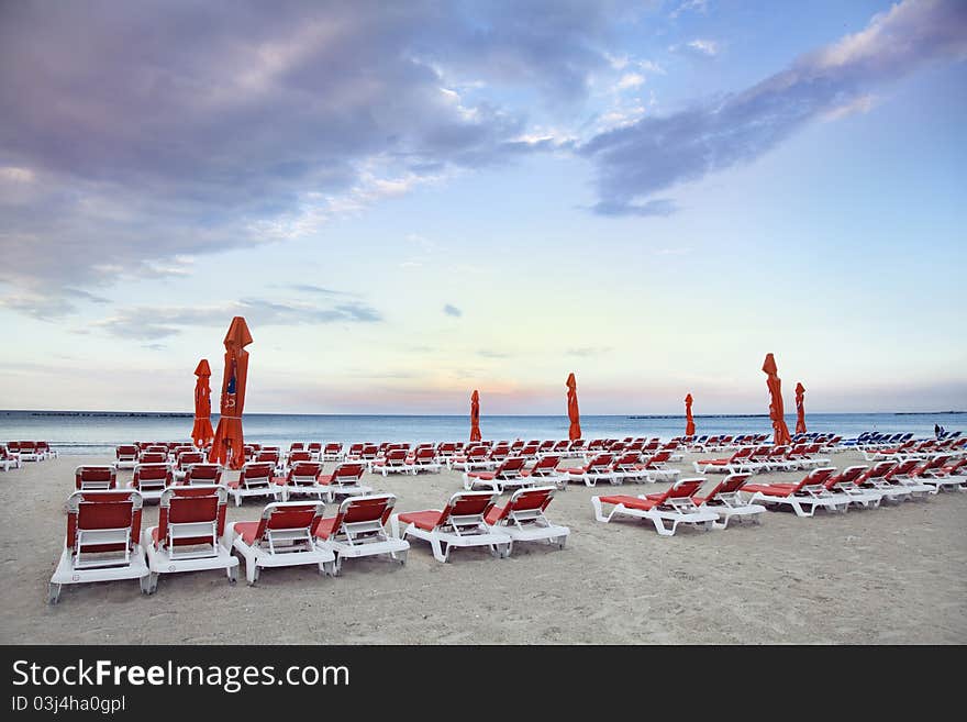 Chaise longue on the beach at sunset (Black Sea, Constanta, Romania)