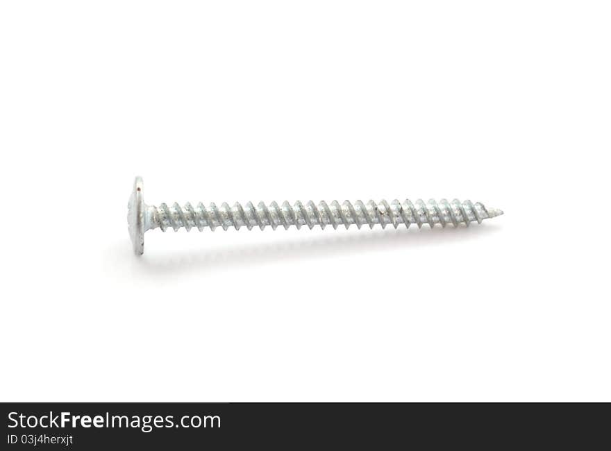 Long screw isolated on white and placed horizontally