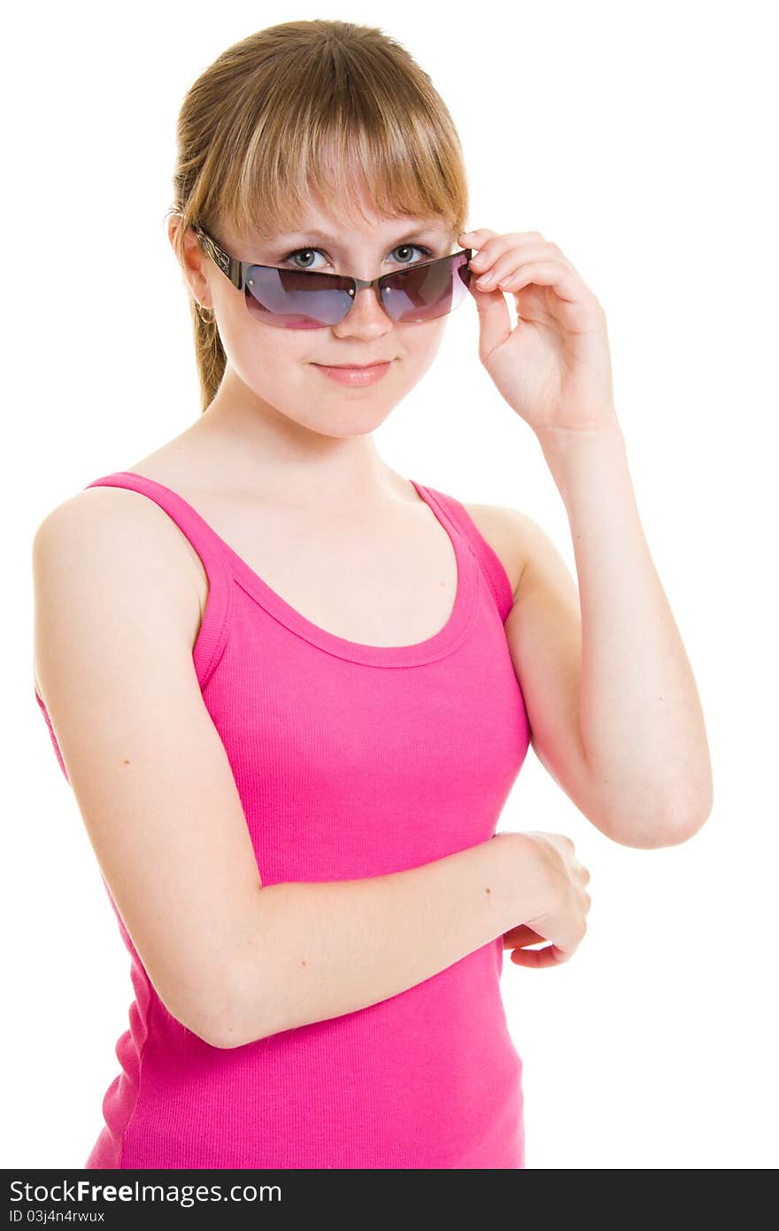 Teen in sunglasses on white background.