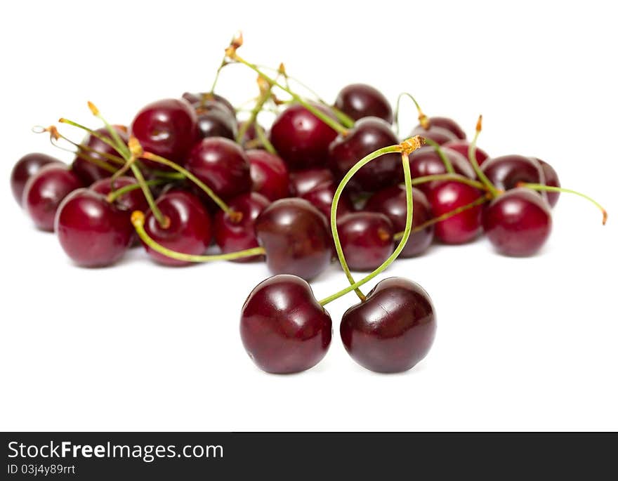 Fresh cherries isolated on white