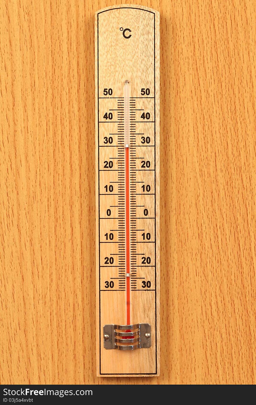 Temperature meter  from the wood   be locate on wood ground. Temperature meter  from the wood   be locate on wood ground