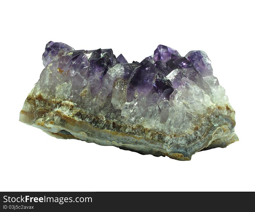 Broken piece of purple amethyst quartz on a white background