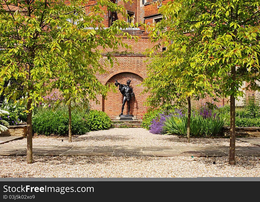 Memorial Garden with Statue with Historic Eton College in the background. Memorial Garden with Statue with Historic Eton College in the background