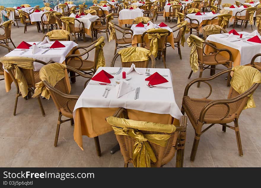 Restaurant party table with served setting.Elegant banquet table prepared for party.